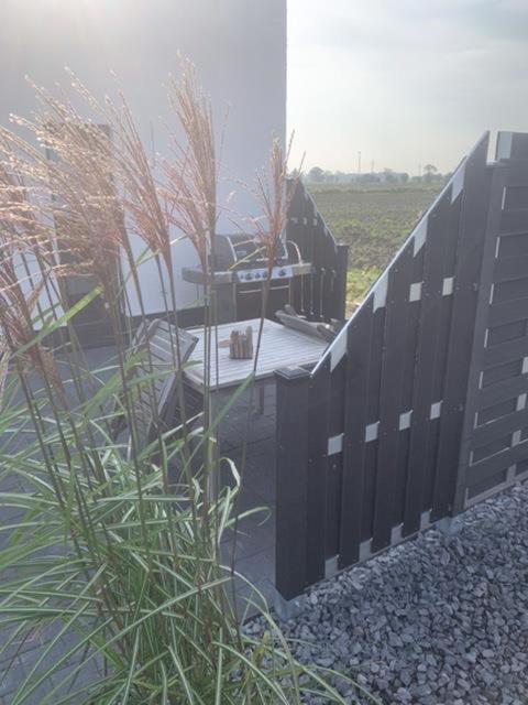 Ferienwohnung Sligter Waterstromen Krummhörn Exterior foto
